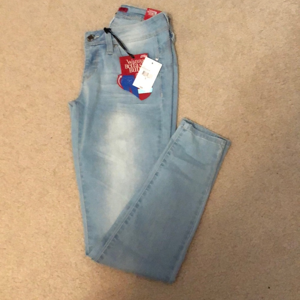 Brand new light washed blue jeans